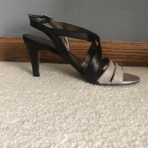 Brand new black and snake skin Heels